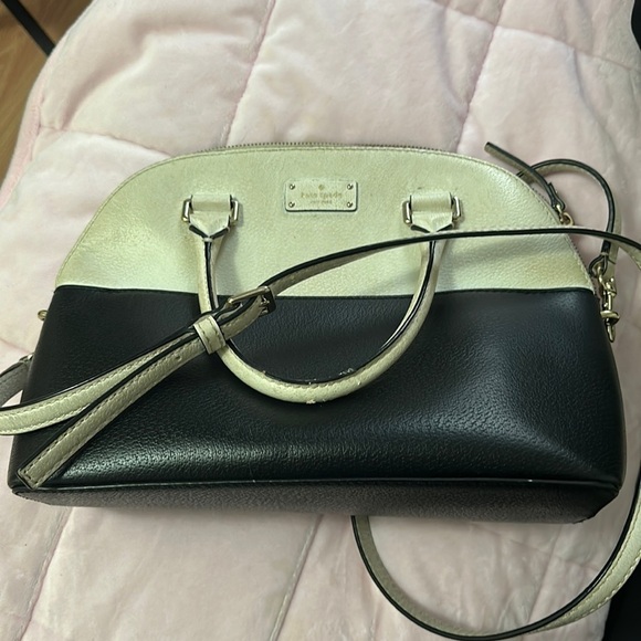 kate spade Handbags - Used Kate spade black and white bag. It is dirty, see pictures but that’s all.